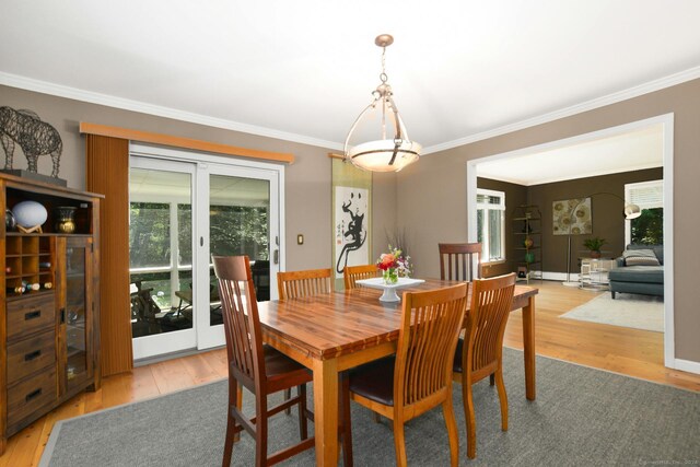 8 Oak Ln, Weston, CT 06883 - dining room featuring wood finished floors and crown molding