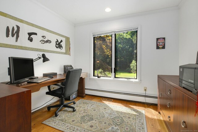 8 Oak Ln, Weston, CT 06883 - home office featuring a baseboard heating unit, ornamental molding, visible vents, and light wood-type flooring