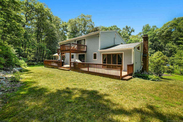8 Oak Ln, Weston, CT 06883 - rear view of property with a yard, a chimney, and a deck