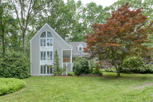 615 Jackson St, Thomaston, CT 06787 - rear view of house with a lawn