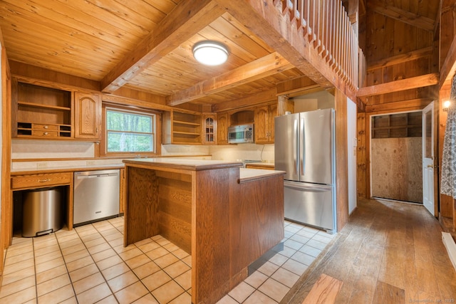 615 Jackson St, Thomaston, CT 06787 - kitchen with stainless steel appliances, open shelves, a wooden ceiling with exposed beams, a center island, and light countertops