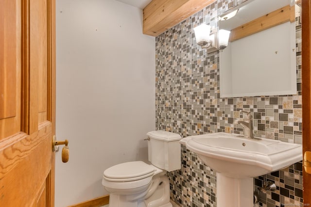 615 Jackson St, Thomaston, CT 06787 - bathroom with decorative backsplash and toilet