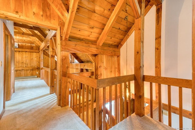 615 Jackson St, Thomaston, CT 06787 - hall with an upstairs landing, baseboard heating, wooden ceiling, carpet flooring, and wood walls