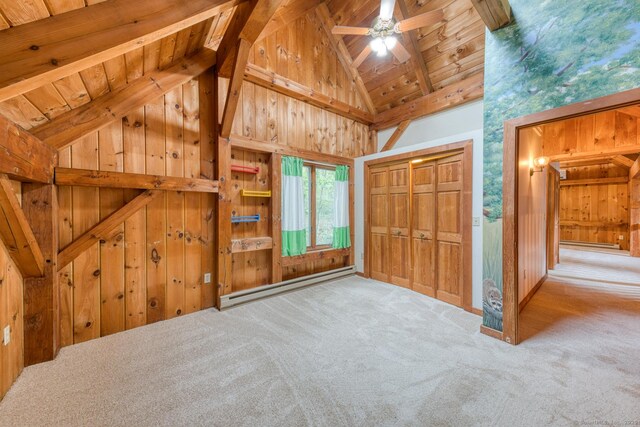615 Jackson St, Thomaston, CT 06787 - unfurnished bedroom with a baseboard heating unit, wood walls, a wooden ceiling with exposed beams, carpet floors, and high vaulted ceiling