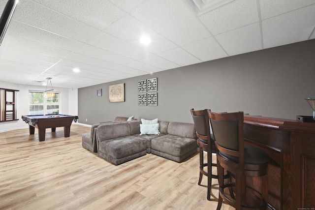 rec room featuring a drop ceiling, a bar, light wood-style flooring, recessed lighting, and billiards