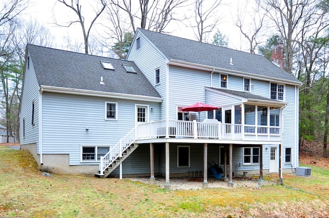 187 Hollister Dr, Avon, CT 06001 - back of house featuring a wooden deck, a yard, a shingled roof, and stairway