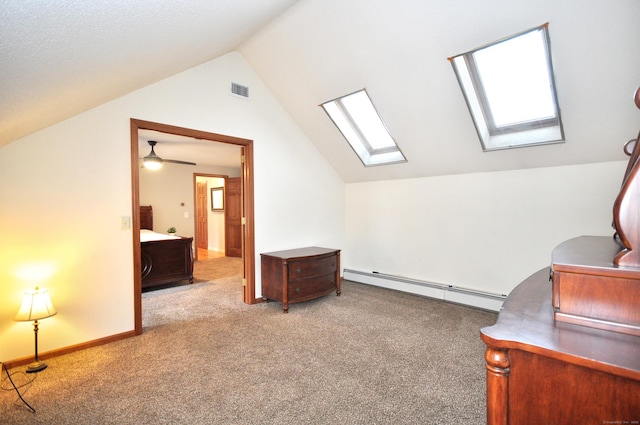 187 Hollister Dr, Avon, CT 06001 - bonus room featuring carpet, a baseboard radiator, and vaulted ceiling with skylight