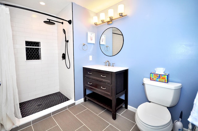 187 Hollister Dr, Avon, CT 06001 - bathroom featuring baseboards, vanity, a tile shower, and toilet
