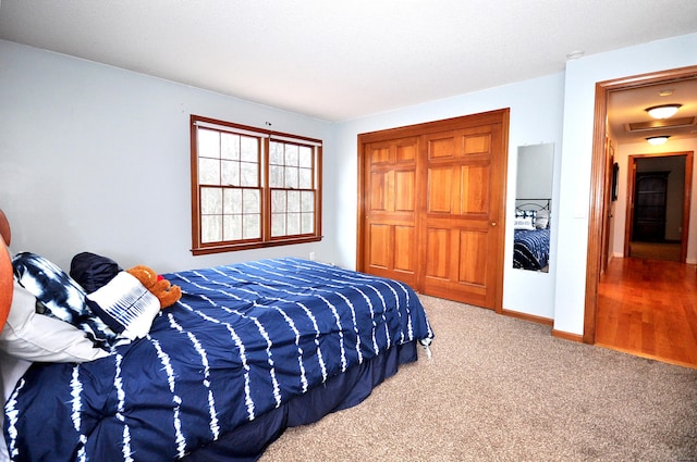 187 Hollister Dr, Avon, CT 06001 - bedroom with carpet floors, a closet, and baseboards