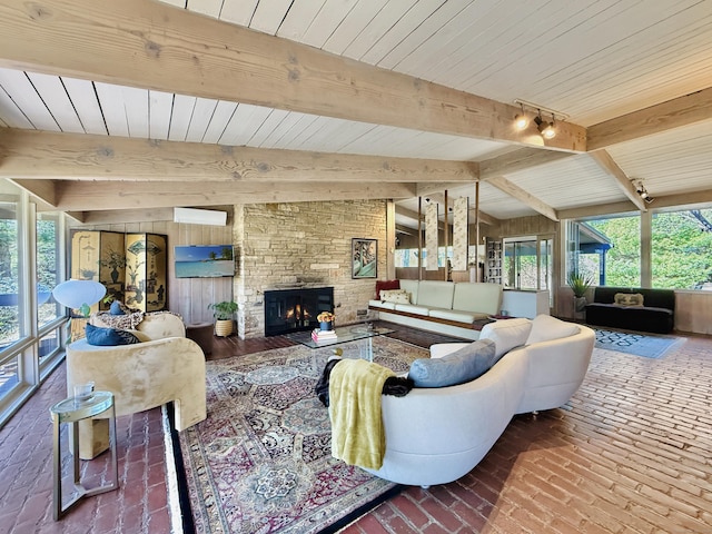 1177 Rock Rimmon Rd, Stamford, CT 06903 - living area featuring wooden ceiling, brick floor, a fireplace, rail lighting, and vaulted ceiling with beams