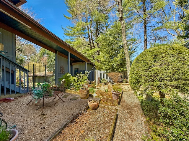 1177 Rock Rimmon Rd, Stamford, CT 06903 - view of yard with a vegetable garden and fence