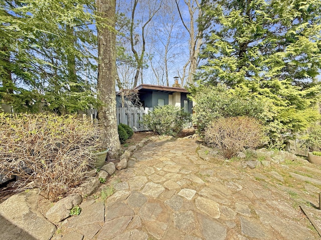 1177 Rock Rimmon Rd, Stamford, CT 06903 - view of property exterior featuring fence and a chimney