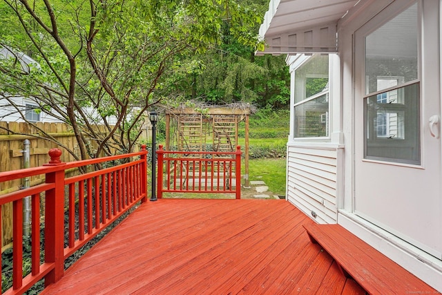 wooden deck featuring fence