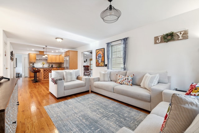 living area with light wood-style flooring