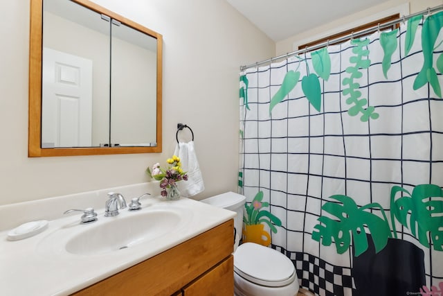 full bath featuring toilet, a shower with curtain, and vanity