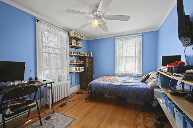 3 Cedar Crest Pl, Norwalk, CT 06854 - bedroom with wood finished floors, a ceiling fan, ornamental molding, and radiator