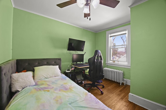 3 Cedar Crest Pl, Norwalk, CT 06854 - bedroom with baseboards, radiator heating unit, wood finished floors, and crown molding