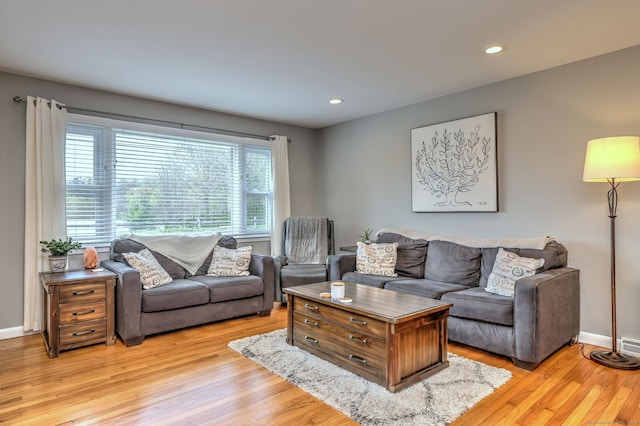 245 Paradise Ave, Hamden, CT 06514 - living area with light wood-style floors, recessed lighting, and baseboards