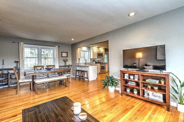 245 Paradise Ave, Hamden, CT 06514 - living room with recessed lighting, baseboards, and light wood-type flooring