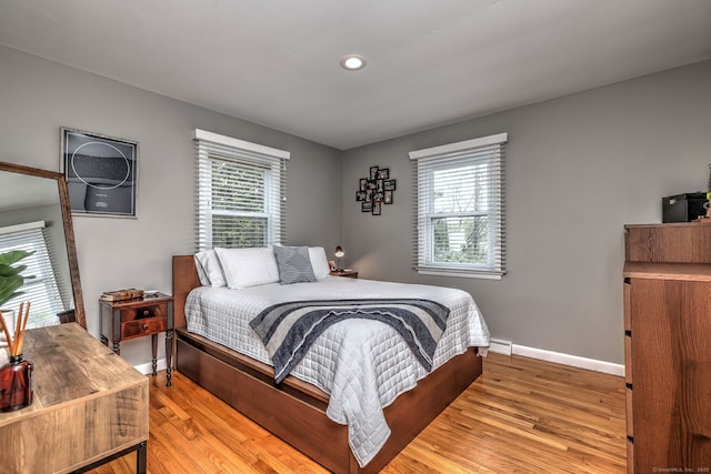 245 Paradise Ave, Hamden, CT 06514 - bedroom with recessed lighting, light wood finished floors, baseboards, and multiple windows