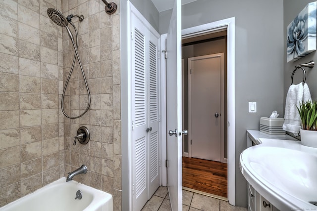 245 Paradise Ave, Hamden, CT 06514 - full bathroom with a closet, a sink, bathtub / shower combination, and tile patterned floors