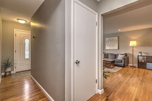 245 Paradise Ave, Hamden, CT 06514 - foyer entrance with baseboards and light wood-style flooring