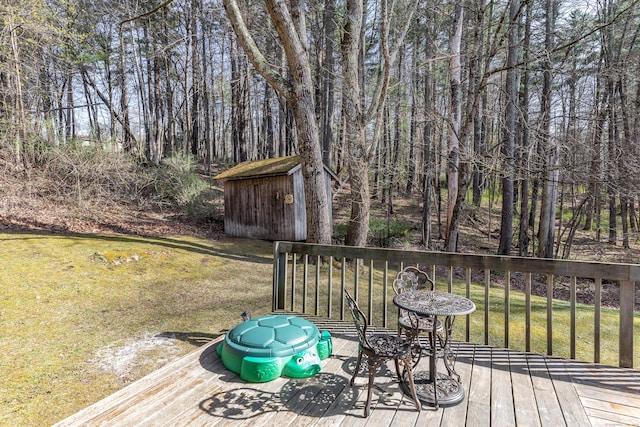 43 Greene Ave, North Canaan, CT 06018 - wooden deck with a storage shed, an outdoor structure, and a yard