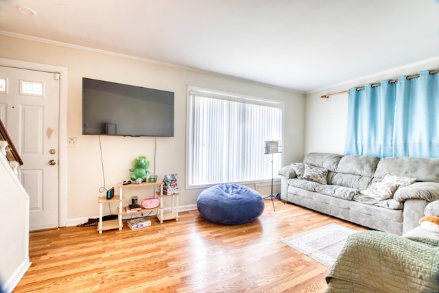 203 Westminster St, Hartford, CT 06112 - living area with light wood finished floors, ornamental molding, and baseboards