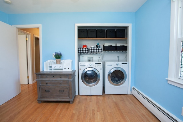 95 Hop Brook Rd, Simsbury, CT 06070 - laundry room with a baseboard heating unit, washer and clothes dryer, and light wood-style floors