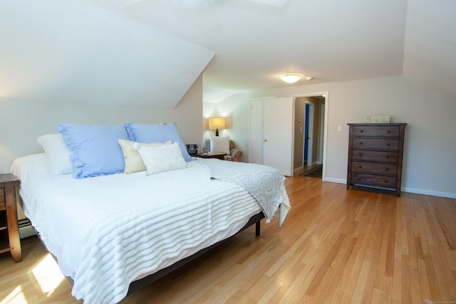 95 Hop Brook Rd, Simsbury, CT 06070 - bedroom featuring vaulted ceiling, wood finished floors, and baseboards