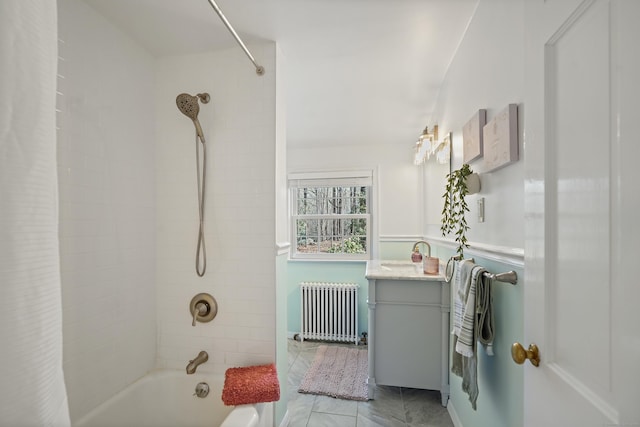bathroom featuring radiator, vanity, and shower / bath combo with shower curtain