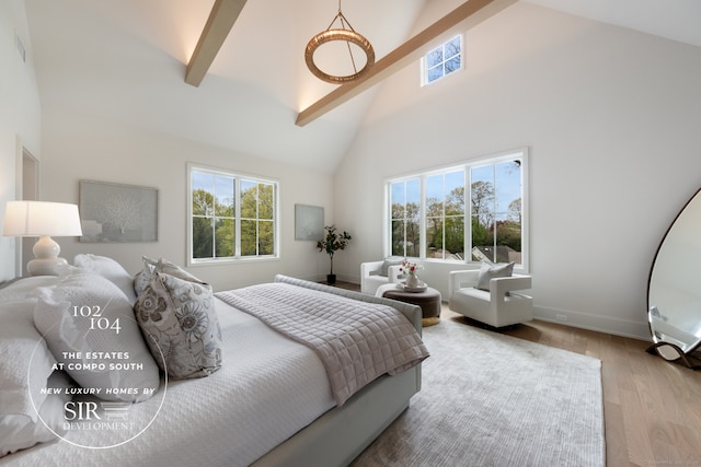 102 Compo Rd S, Westport, CT 06880 - bedroom with beam ceiling, high vaulted ceiling, multiple windows, and wood finished floors