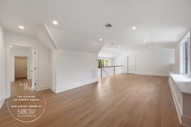 102 Compo Rd S, Westport, CT 06880 - additional living space with recessed lighting, light wood-style floors, visible vents, and vaulted ceiling