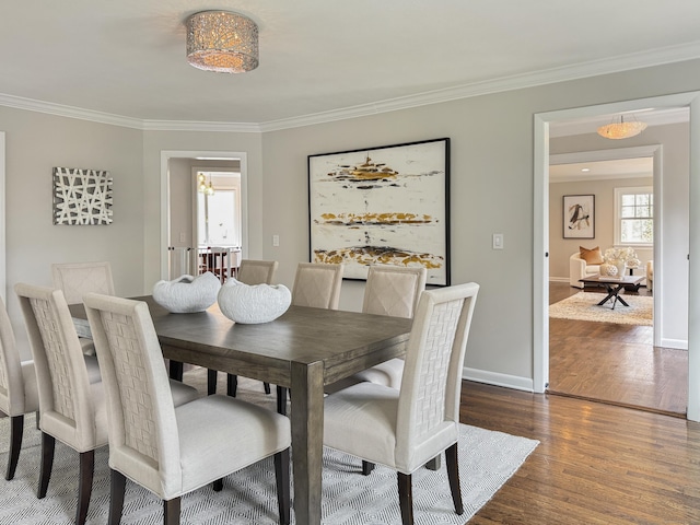 18 Cardinal Rd, Weston, CT 06883 - dining area with ornamental molding and dark wood finished floors