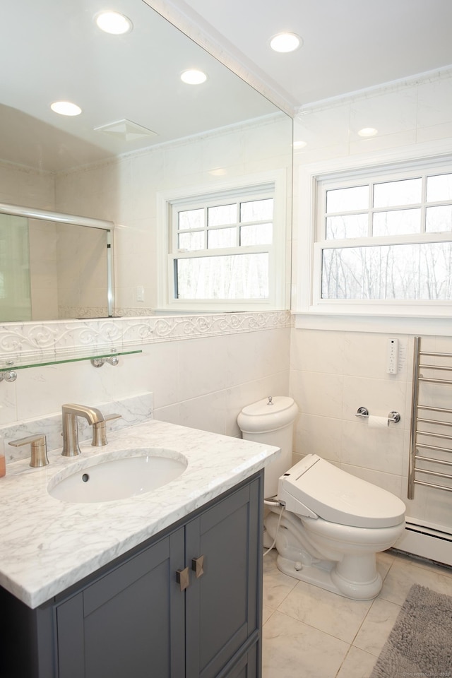 18 Cardinal Rd, Weston, CT 06883 - full bath featuring tile walls, plenty of natural light, vanity, a baseboard heating unit, and a stall shower