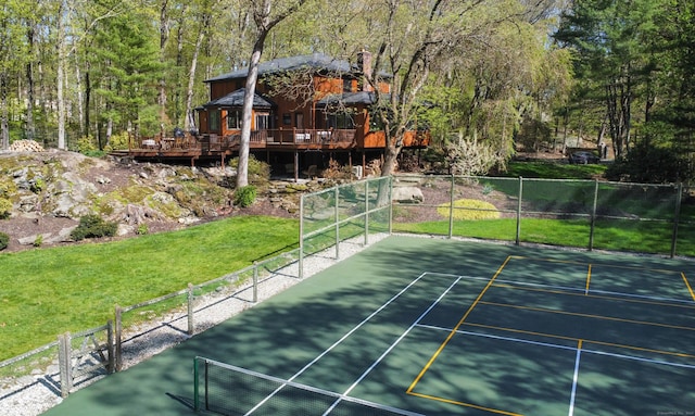 18 Cardinal Rd, Weston, CT 06883 - surrounding community featuring a tennis court, a deck, and a wooded view