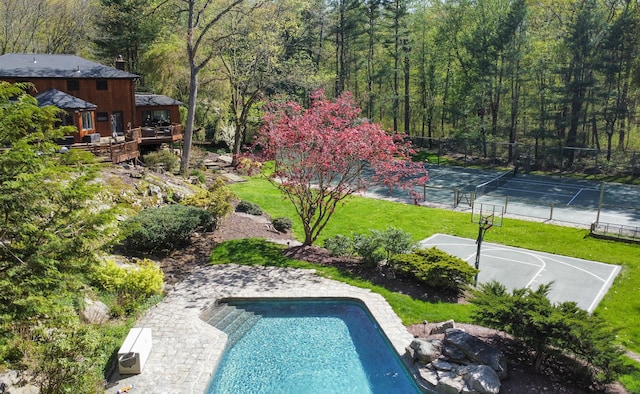 18 Cardinal Rd, Weston, CT 06883 - outdoor pool featuring a wooded view