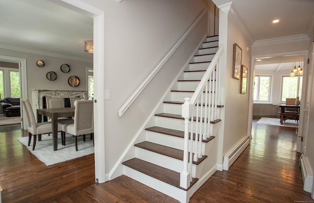 18 Cardinal Rd, Weston, CT 06883 - stairway with a baseboard radiator, wood finished floors, ornamental molding, recessed lighting, and a chandelier