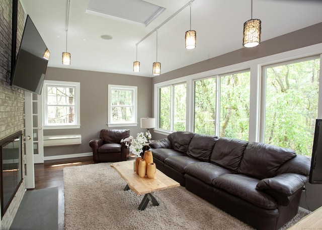 18 Cardinal Rd, Weston, CT 06883 - living room with wood finished floors and a brick fireplace