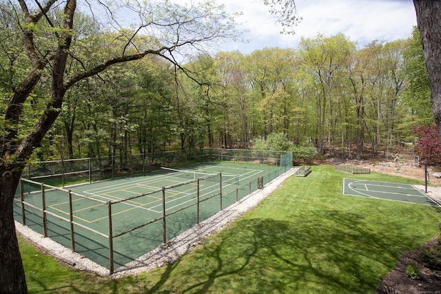18 Cardinal Rd, Weston, CT 06883 - view of tennis court with a view of trees