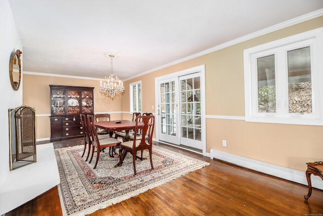 594 Barrack Hill Rd, Ridgefield, CT 06877 - dining area featuring baseboard heating, a chandelier, wood finished floors, crown molding, and baseboards