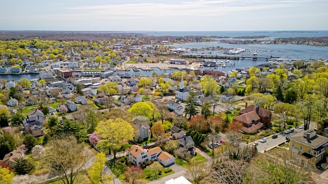 bird's eye view featuring a residential view and a water view
