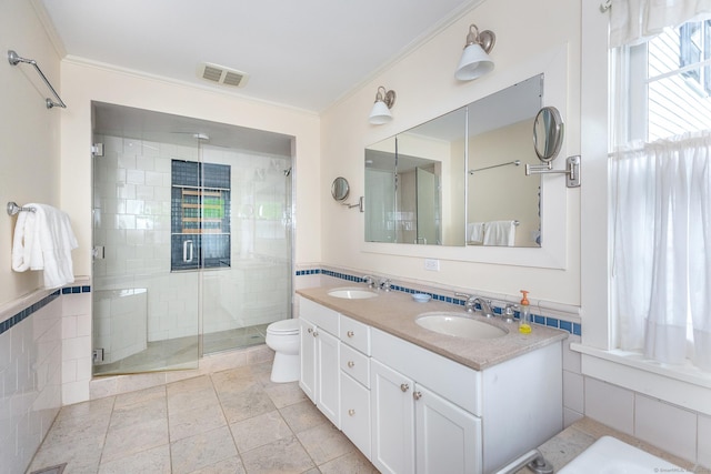 341 Housatonic River Rd, Salisbury, CT 06068 - full bath with crown molding, a shower stall, toilet, double vanity, and tile walls
