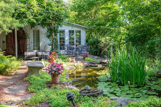 341 Housatonic River Rd, Salisbury, CT 06068 - view of yard with a patio area and a small pond