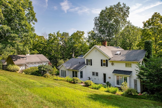 341 Housatonic River Rd, Salisbury, CT 06068 - rear view of property with a chimney, a lawn, and a shingled roof