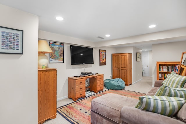 living room with recessed lighting, baseboards, light colored carpet, and visible vents