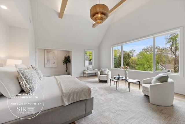 104 Compo Rd S, Westport, CT 06880 - bedroom with a walk in closet, beam ceiling, high vaulted ceiling, and wood finished floors