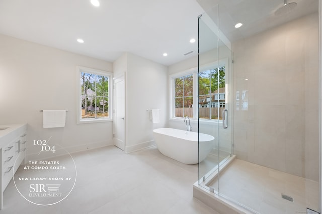 104 Compo Rd S, Westport, CT 06880 - bathroom with a soaking tub, a shower stall, plenty of natural light, and recessed lighting