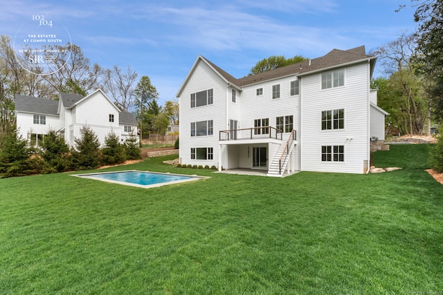 104 Compo Rd S, Westport, CT 06880 - back of property with a yard, a patio area, a wooden deck, and an outdoor pool