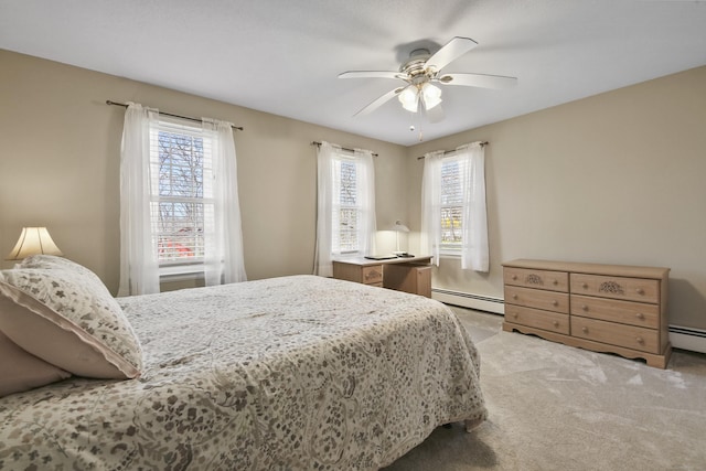 43 Attawanhood Trl, Hebron, CT 06231 - bedroom featuring a baseboard radiator, a ceiling fan, and light carpet